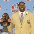 FILE - In this Aug. 6, 2011 file photo, Richard Dent poses with a bust of himself during induction ceremonies at the Pro Football Hall of Fame in Canton, Ohio. A group of retired NFL players says in a lawsuit that the league illegally supplied them with risky painkillers that numbed their injuries and led to medical complications. Attorney Steven Silverman says his firm filed the lawsuit Tuesday, May 20, 2014, in federal court in San Francisco. The eight named plaintiffs include Hall of Fame defensive end Dent and quarterback Jim McMahon.(AP Photo/Tony Dejak, File)