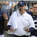 Penn State head coach Bill O'Brien, center, stands in front of Penn State quarterbacks Paul Jones (7) Steven Bench, right, on the sidelines during the first quarter of an NCAA college football game against Ohio at Beaver Stadium in State College, Pa., Saturday, Sept. 1, 2012. (AP Photo/Gene J. Puskar)