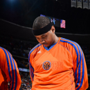 DENVER, CO - MARCH 13: Carmelo Anthony #7 of the New York Knicks listens to the National Anthem before playing against the Denver Nuggets on March 13, 2013 at the Pepsi Center in Denver, Colorado. (Photo by Garrett W. Ellwood/NBAE via Getty Images)