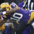 LSU wide receiver Russell Shepard dives into the end zone, scoring on a 78-yard touchdown run in the first half of an NCAA college football game against Towson in Baton Rouge, La., Saturday, Sept. 29, 2012. (AP Photo/Bill Haber)