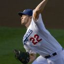 Los Angeles Dodgers starting pitcher Clayton Kershaw throws to a San Francisco Giants batter during the first inning of a baseball game Wednesday, Oct. 3, 2012, in Los Angeles. (AP Photo/Mark J. Terrill)