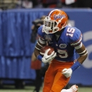 Florida defensive back Loucheiz Purifoy (15) looks for running room in the first half of the Sugar Bowl NCAA college football game against Louisville on Wednesday, Jan. 2, 2013, in New Orleans. (AP Photo/Butch Dill)