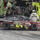 Jeff Gordon (24) heads to the garage after he brushed the wall during the NASCAR Sprint Cup series auto race at Texas Motor Speedway in Fort Worth, Texas, Sunday, Nov. 3, 2013. Gordon returned to the race after repairs to his car. (AP Photo/Brandon Wade)