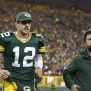Green Bay Packers' Aaron Rodgers heads to the locker room after being hurt during the first half of an NFL football game against the Chicago Bears Monday, Nov. 4, 2013, in Green Bay, Wis. (AP Photo/Jeffrey Phelps)