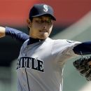Seattle Mariners starter Hisashi Iwakuma, of Japan, pitches to the Los Angeles Angels in the second inning of a baseball game in Anaheim, Calif., Thursday, Sept. 27, 2012. (AP Photo/Reed Saxon)