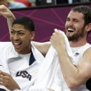 FILE- In this Aug. 2, 2012, file photo, the United States' Anthony Davis, left, and  Kevin Love share a laugh during a men's preliminary round basketball game against Nigeria at the 2012 Summer Olympics in London.  Love is back in Minnesota after a summer highlighted by an Olympic gold medal. He's gearing up for one of the most anticipated seasons in the Timberwolves' hardscrabble history, with training camp starting next week. (AP Photo/Eric Gay, File)