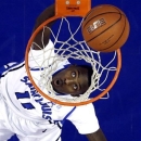 Saint Louis' Mike McCall Jr. watches as his layup falls in during the first half of an NCAA college basketball game against Butler on Thursday, Jan. 31, 2013, in St. Louis. (AP Photo/Jeff Roberson)
