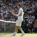Andy Murray of Britain reacts as he defeats Mikhail Youzhny of Russia in a Men's singles match at the All England Lawn Tennis Championships in Wimbledon, London, Monday, July 1, 2013. (AP Photo/Alastair Grant)