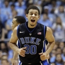 Duke's Seth Curry (30) reacts following a basket against North Carolina during the first half of an NCAA college basketball game in Chapel Hill, N.C., Saturday, March 9, 2013. (AP Photo/Gerry Broome)