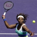 Serena Williams returns a shot to Maria Sharapova, of Russia, during the final match of the Sony Open tennis tournament, Saturday, March 30, 2013, in Key Biscayne, Fla. (AP Photo/Wilfredo Lee)