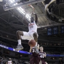 Syracuse forward Rakeem Christmas (25) dunks against Montana during the second half of a second-round game in the NCAA college basketball tournament in San Jose, Calif., Thursday, March 21, 2013. Syracuse won 81-34. (AP Photo/Jeff Chiu)