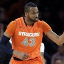 Syracuse's James Southerland (43) reacts after scoring during the first half of an NCAA college basketball championship game against Louisville at the Big East Conference tournament Saturday, March 16, 2013, in New York. (AP Photo/Frank Franklin II)