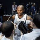 Brooklyn Nets Jerry Stackhouse is surrounded during team media day, in the Brooklyn borough of New York,  Monday, Oct. 1, 2012. (AP Photo/Stuart Ramson)