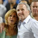 FILE - In this Sept. 25, 2008 photo, Los Angeles Dodgers owner and chairman Frank McCourt and his wife Jamie McCourt after the Dodgers' baseball game against the San Diego Padres in Los Angeles. The ex-wife of former Los Angeles Dodgers owner Frank McCourt wants to set aside the couple's divorce settlement, claiming he vastly understated the value of a team that sold earlier this year for $2 billion, the highest figure ever paid for a pro sports franchise. The motion filed Monday Sept. 24, 2012 in Los Angeles Superior Court claims Frank McCourt committed fraud by misrepresenting the couple's Dodgers assets as worth less than $300 million during their protracted divorce. (AP Photo/Carlos Delgado, File)