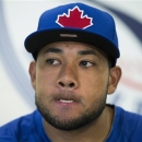 Toronto Blue Jays' Melky Cabrera listens to a question during a news conference at baseball spring training, Friday, Feb. 15, 2013, in Dunedin, Fla. (AP Photo/The Canadian Press, Nathan Denette)