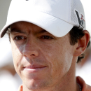 Golfer Rory McIlroy gives a television interview on the 10th tee during the pro-am round of the BMW Championship golf tournament at Conway Farms Golf Club in Lake Forest. Ill., Wednesday, Sept. 11, 2013. (AP Photo/Charles Rex Arbogast)