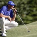Dustin Johnson of the U.S. lines up a putt at the 18th hole during the third round of the Deutsche Bank Championship golf tournament in Norton, Massachusetts September 2, 2012. REUTERS/Dominick Reuter
