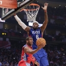 West Team's Chris Paul of the Los Angeles Clippers shoots against East Team's LeBron James of the Miamia Heat during the first half of the NBA All-Star basketball game Sunday, Feb. 17, 2013, in Houston. (AP Photo/Eric Gay)