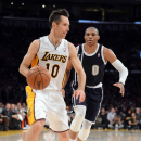 LOS ANGELES, CA - JANUARY 27:  Steve Nash #10 of the Los Angeles Lakers dribbles by Russell Westbrook #0 of the Oklahoma City Thunder at Staples Center on January 27, 2013 in Los Angeles, California.  (Photo by Harry How/Getty Images)