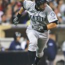 Seattle Mariners' Ichiro Suzuki races up the first-base line on an RBI single against the San Diego Padres during the fourth iinning of a baseball game Saturday, June 23, 2012, in San Diego. (AP Photo/Lenny Ignelzi)