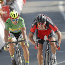 Belgium's Greg van Avermaet, right, crosses the finish line ahead of Peter Sagan of Slovakia, wearing the best sprinter's green jersey, to win the thirteenth stage of the Tour de France cycling race over 198.5 kilometers (123.3 miles) with start in Muret and finish in Rodez, France, Friday, July 17, 2015. (AP Photo/Laurent Cipriani)