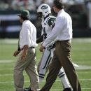 In this Sept. 9, 2012 photo, New York Jets' Darrelle Revis (24) is ecsorted off the field after being injured on a play during the first half of an NFL football game against the Buffalo Bills, at MetLife Stadium in East Rutherford, N.J. The star cornerback suffered what the team called a 