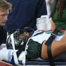 Hawaii defensive lineman Geordon Hanohano is taken off the field on a backboard during the first quarter of an NCAA college football game against Hawaii on Friday, Sept. 28, 2012, in Provo, Utah. (AP Photo/Rick Bowmer)