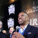 Sacramento Mayor Kevin Johnson smiles during a news conference, Monday, April 29, 2013, in Sacramento, Calif. The NBA's relocation committee voted unanimously Monday to recommend that owners reject the application for the Sacramento Kings basketball team to relocate to Seattle, the latest _ and by far the strongest _ in a long line of cities that almost landed the franchise. (AP Photo/Rich Pedroncelli)