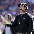 San Francisco 49ers head coach Jim Harbaugh yells during the second quarter of an NFL football game against the Buffalo Bills in San Francisco, Sunday, Oct. 7, 2012. (AP Photo/Tony Avelar)
