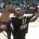 Wichita State's Cleanthony Early (11) celebrates after his team defeated Gonzaga 76-70 during a third-round game in the NCAA men's college basketball tournament in Salt Lake City Saturday, March 23, 2013. (AP Photo/Rick Bowmer)