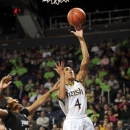 Notre Dame guard Skylar Diggins (4) shoots over Providence forward Brianna Edwards in the first half of an NCAA college basketball game, Saturday, Jan. 26, 2013, in South Bend, Ind. (AP Photo/Joe Raymond)