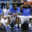 Middle Tennessee players sit on the bench in the closing seconds of their 67-54 loss to St. Mary's in a first-round game of the NCAA men's college basketball tournament, Tuesday, March 19, 2013, in Dayton, Ohio. (AP Photo/Al Behrman)