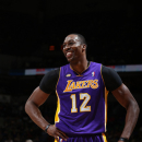 MINNEAPOLIS, MN - MARCH 27: Dwight Howard  #12 of the Los Angeles Lakers smiles after a play against the Minnesota Timberwolves during the game on March 27, 2013 at Target Center in Minneapolis, Minnesota. (Photo by David Sherman/NBAE via Getty Images)