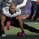 New Orleans Saints tight end Jimmy Graham (80) stretches during warm ups before an NFL football game against the New England Patriots Sunday, Oct.13, 2013, in Foxborough, Mass. (AP Photo/Stephan Savoia)