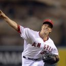 Los Angeles Angels starting pitcher Zack Greinke throws to the plate during the second inning of their baseball game, Tuesday, Sept. 25, 2012, in Anaheim, Calif. (AP Photo/Mark J. Terrill)