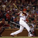 St. Louis Cardinals' Carlos Beltran hits an RBI single during the third inning of Game 4 of baseball's World Series against the Boston Red Sox Sunday, Oct. 27, 2013, in St. Louis. (AP Photo/Jeff Roberson)