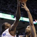 Oklahoma City Thunder power forward Serge Ibaka (9), from the Republic of Congo, blocks a shot by San Antonio Spurs center Tim Duncan (21) during the first half of Game 6 in the NBA basketball Western Conference finals, Wednesday, June 6, 2012, in Oklahoma City. (AP Photo/Eric Gay)