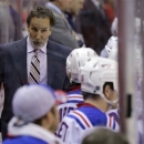 FILE - In this May 10, 2013 file photo, New York Rangers head coach John Tortorella talks with his team in the second period of Game 5 in the first-round NHL Stanley Cup playoff hockey series against the Washington Capitals, in Washington. The Rangers have fired coach Tortorella, Wednesday, May 29, 2013, four days after New York was eliminated from the Stanley Cup playoffs.(AP Photo/Alex Brandon)
