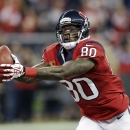 Houston Texans' Andre Johnson catches a pass from Case Keenum for a touchdown during the first quarter of an NFL football game against the Indianapolis Colts, Sunday, Nov. 3, 2013, in Houston. (AP Photo/David J. Phillip)
