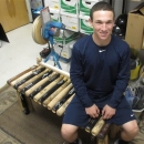 FILE - In this Jan. 10, 2011 file photo, baseball player Alex Bregman poses while seated on a bench made from old bats at the Albuquerque Baseball Academy in Albuquerque, N.M. Bregman was considered a potential first-round draft pick before breaking his finger his senior year at Albuquerque Academy. After getting picked by the Boston Red Sox in the 29th round, Bregman went to LSU and is batting .444 with 41 runs scored and 35 RBIs in 34 games.(AP Photo/Tim Korte, File)