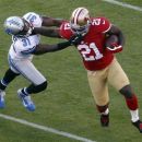 San Francisco 49ers running back Frank Gore, right, carries the ball past Detroit Lions defensive back Drayton Florence, left, during the second quarter of an NFL football game in San Francisco, Sunday, Sept. 16, 2012. (AP Photo/Tony Avelar)