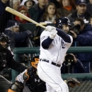 Detroit Tigers catcher Alex Avila hits a single during the fifth inning of Game 3 of baseball's World Series Saturday, Oct. 27, 2012, in Detroit. (AP Photo/Carlos Osorio)