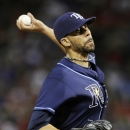 Tampa Bay Rays starting pitcher David Price delivers to the Texas Rangers during the first inning of an American League wild-card tiebreaker baseball game Monday, Sept. 30, 2013, in Arlington, Texas. (AP Photo/Tony Gutierrez)