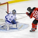 New Jersey Devils' Jaromir Jagr (68), of the Czech Republic, scores an unassisted goal against Tampa Bay Lightning goaltender Ben Bishop during the second period of an NHL hockey game Tuesday, Oct. 29, 2013, in Newark, N.J. (AP Photo/Bill Kostroun)