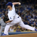 LOS ANGELES, CA - APRIL 15:  Chad Billingsley of the Los Angeles Dodgers throws a pitch against the San Diego Padres at Dodger Stadium on April 15, 2013 in Los Angeles, California.  All uniformed team members are wearing jersey number 42 in honor of Jackie Robinson Day.  (Photo by Stephen Dunn/Getty Images)