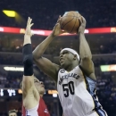 Memphis Grizzlies' Zach Randolph (50) shoots over Los Angeles Clippers' Blake Griffin during the second half of Game 4 in a first-round NBA basketball playoff series in Memphis, Tenn., Saturday, April 27, 2013. The Grizzlies defeated the Clippers 104-83. (AP Photo/Danny Johnston)