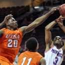 UTSA's Edrico McGregor (20) blocks a shot by UT Arlington's Jamel Outler (3) during the first half of a Western Athletic Conference tournament NCAA college basketball game, Friday, March 15, 2013 in Las Vegas. (AP Photo/David Becker)