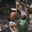 Florida State's Ian Miller tries to get to the basket as Miami's Reggie Johnson defends during the first half of an NCAA college basketball game Wednesday, Feb. 13, 2013, in Tallahassee, Fla. Miami held off Florida State to win 74-68. (AP Photo/Steve Cannon)