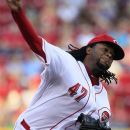 Cincinnati Reds starting pitcher Johnny Cueto throws against the Pittsburgh Pirates in the second inning of a baseball game, Wednesday, June 6, 2012 in Cincinnati. (AP Photo/Al Behrman)