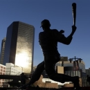 A statue of former St. Louis Cardinals baseball player Stan Musial stands outside Busch Stadium Sunday, Jan. 20, 2013, in St. Louis. Musial, one of baseball's greatest hitters and a Hall of Famer with the Cardinals for more than two decades, died Saturday, Jan. 19, 2013, the team announced. He was 92. (AP Photo/Jeff Roberson)